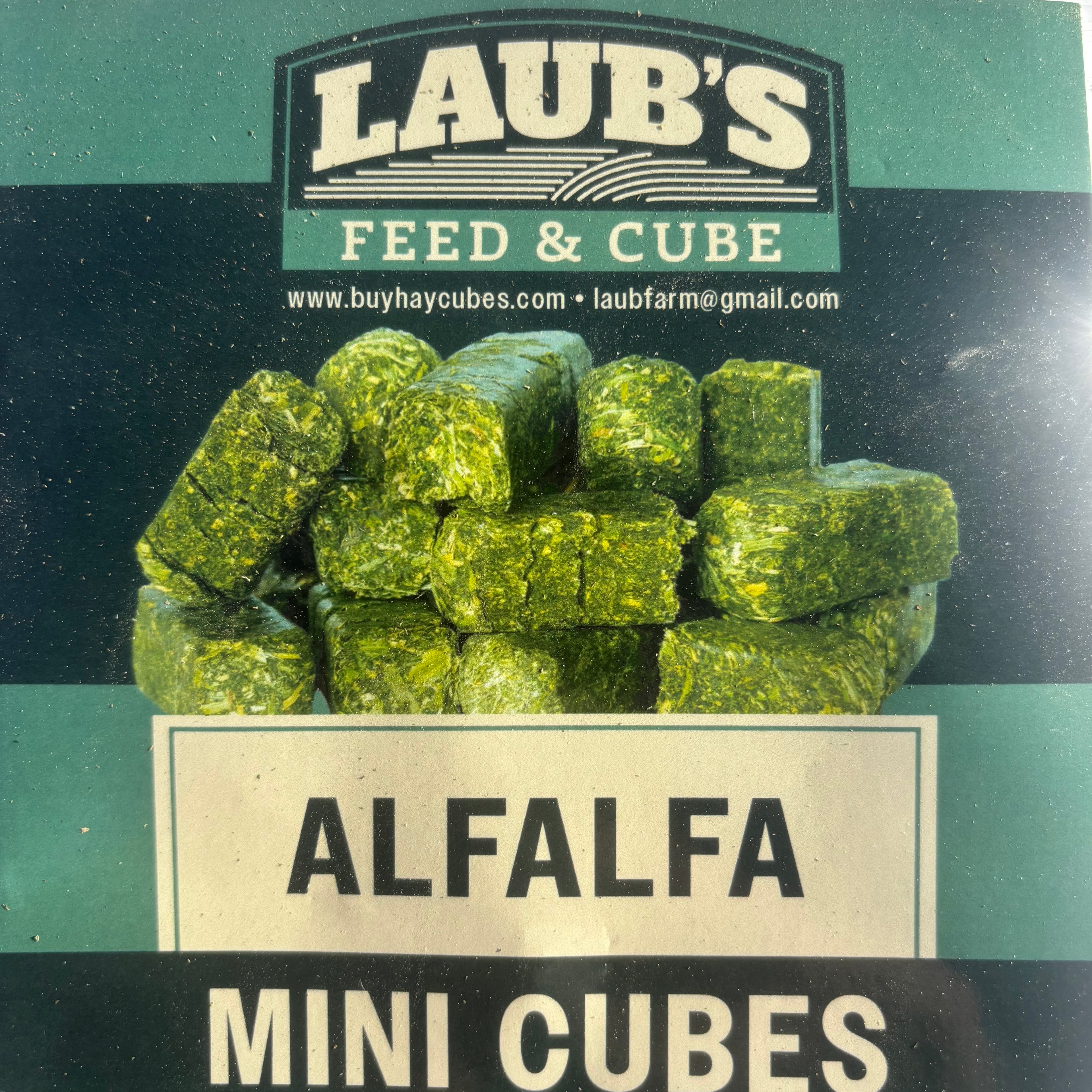 Laub's Feed & Cube Alfalfa Mini Cubes packaging on a green background